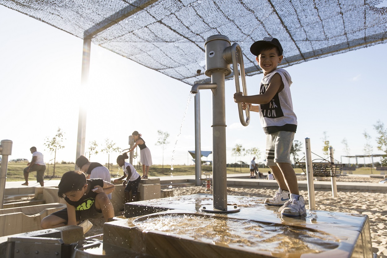 kids playing in the water play area at Bungarribee playground