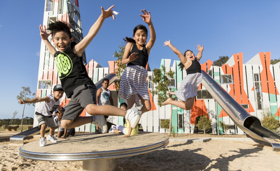 Kids jumping in the air at Bungarribee playground