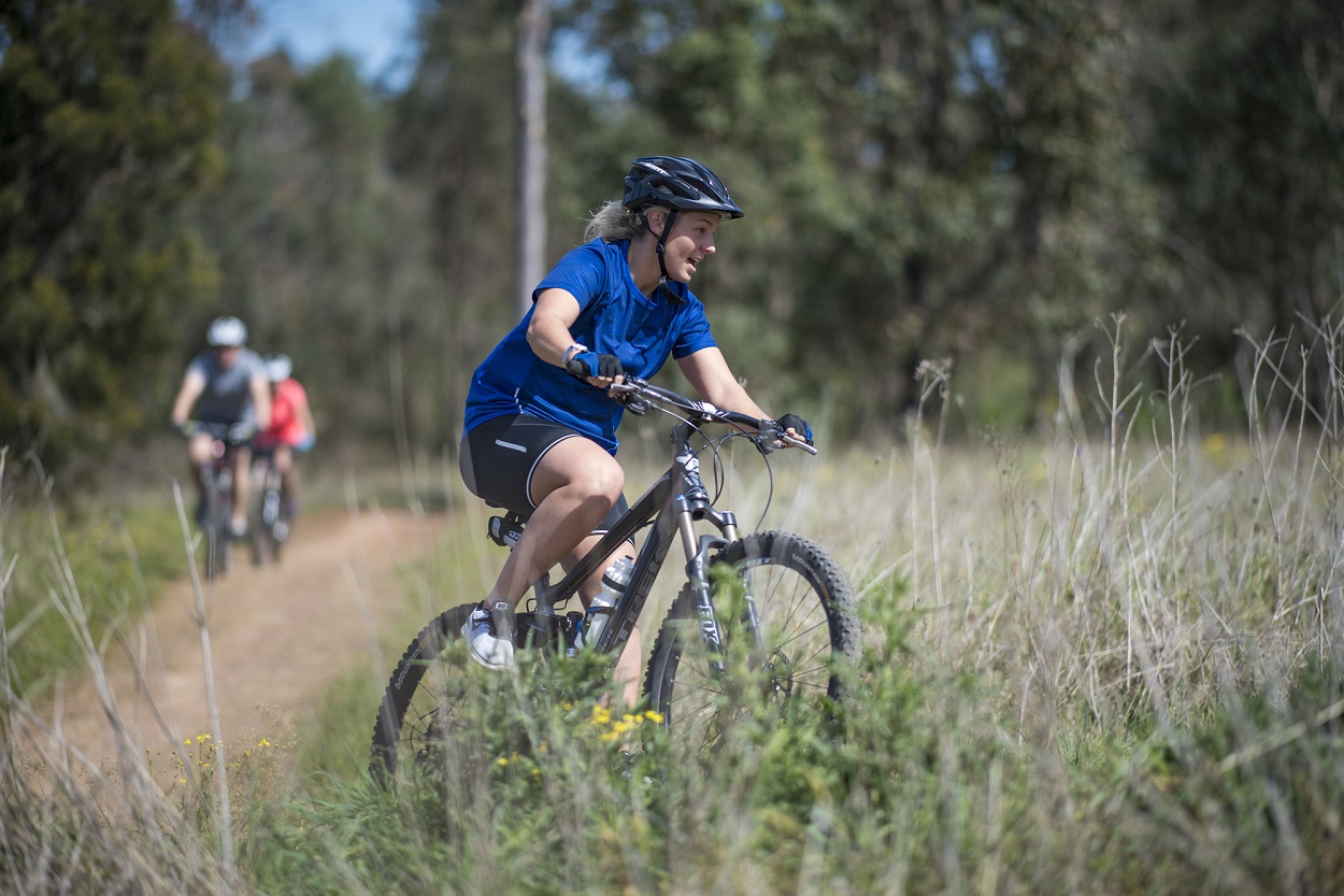 lady rider at wylde making a turn